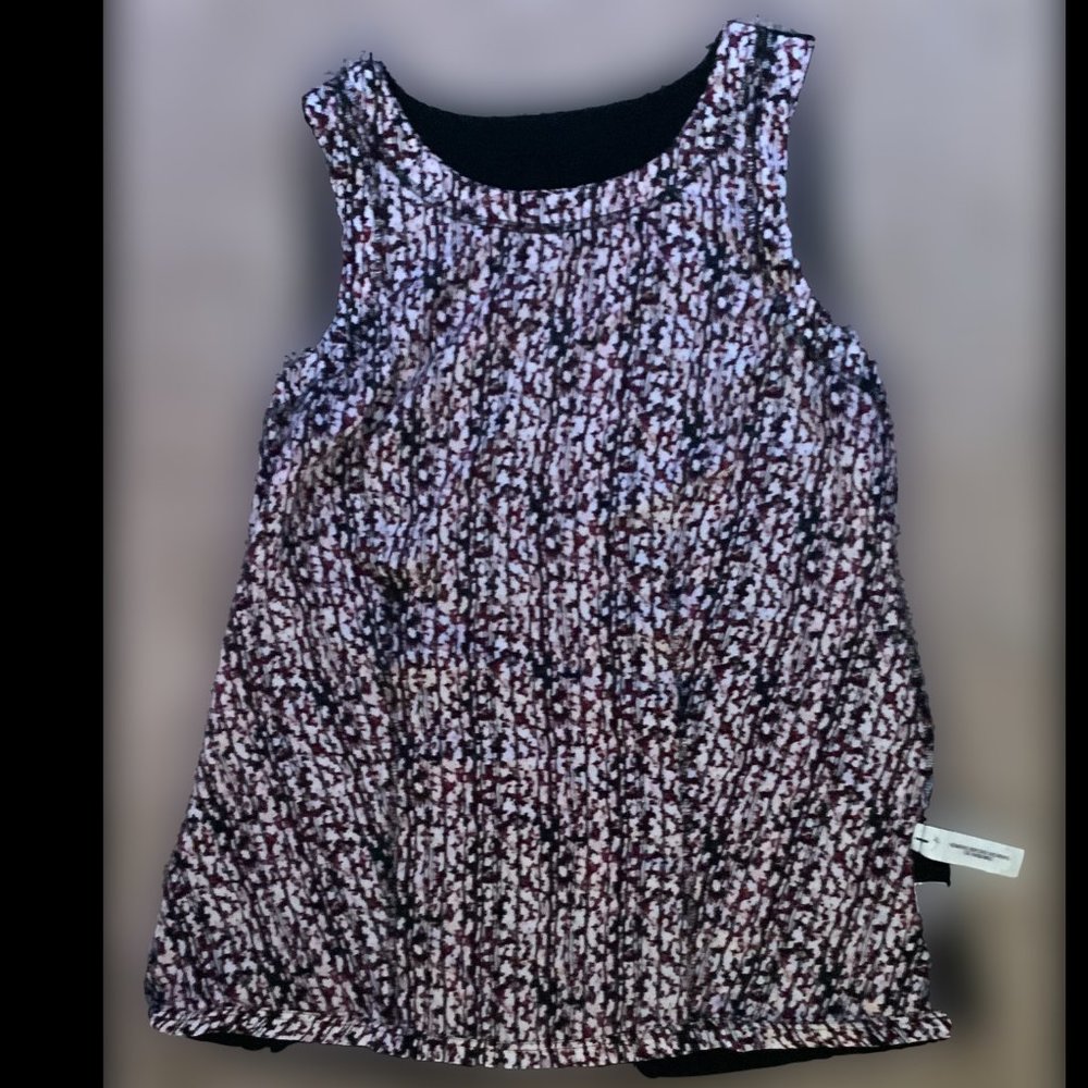 Sleeveless top with soft t-shirt material back